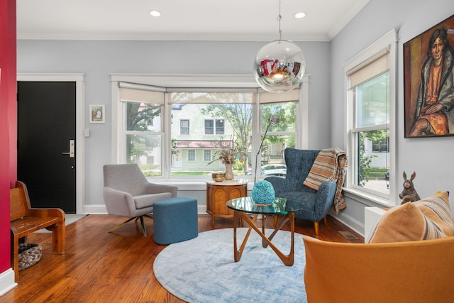 637 Highland Ave, Oak Park, IL 60304 - living area featuring wood finished floors, crown molding, and recessed lighting