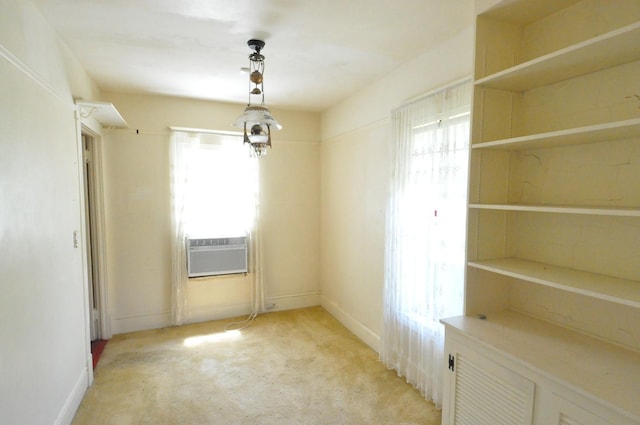 4816 Auburn St, Rockford, IL 61101 - unfurnished dining area featuring light colored carpet and cooling unit