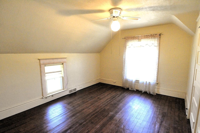 4816 Auburn St, Rockford, IL 61101 - additional living space featuring dark wood-style floors, vaulted ceiling, and ceiling fan