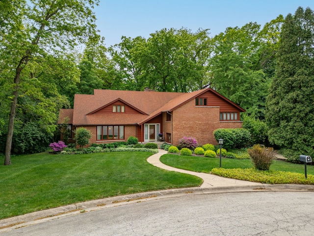 4303 Singleton Close, Rockford, IL 61114 - mid-century home with brick siding and a front lawn
