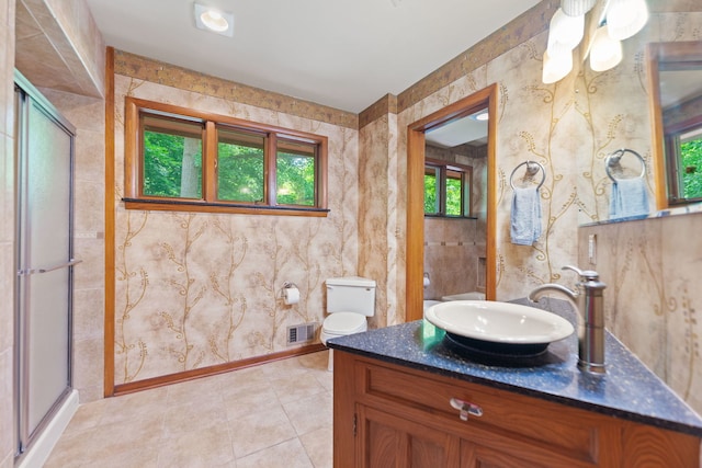 4303 Singleton Close, Rockford, IL 61114 - full bathroom featuring a stall shower, vanity, and tile patterned flooring