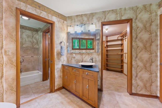 4303 Singleton Close, Rockford, IL 61114 - full bath with vanity, a spacious closet, tile patterned flooring, and a bathtub