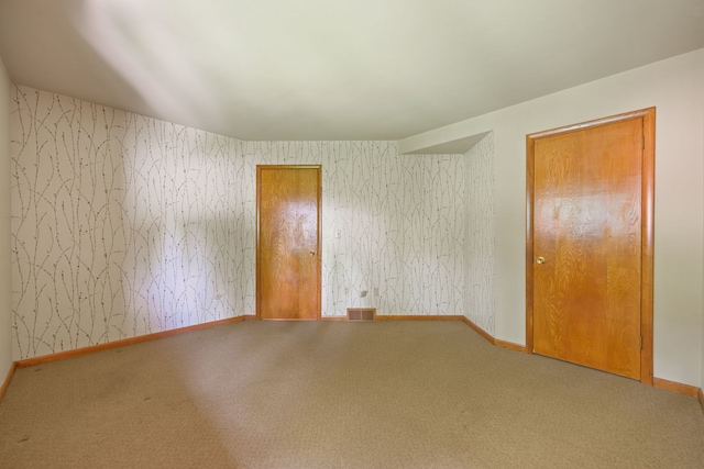 4303 Singleton Close, Rockford, IL 61114 - carpeted empty room with baseboards