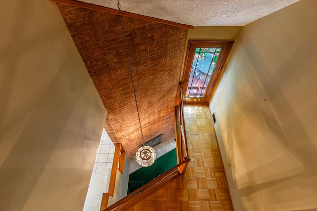 4303 Singleton Close, Rockford, IL 61114 - stairway with a textured ceiling