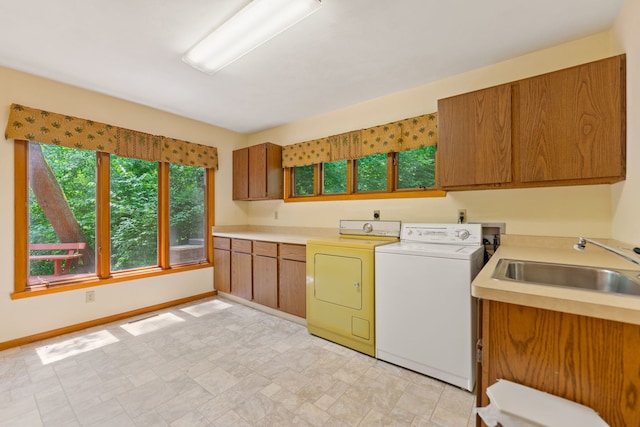 4303 Singleton Close, Rockford, IL 61114 - laundry room with washer and clothes dryer and cabinet space