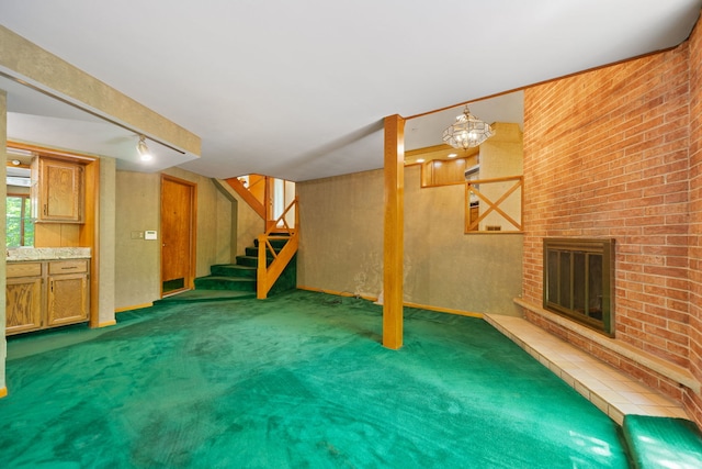 4303 Singleton Close, Rockford, IL 61114 - basement featuring stairs, carpet floors, a brick fireplace, and rail lighting
