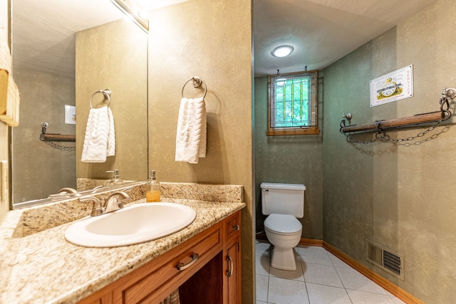 4303 Singleton Close, Rockford, IL 61114 - bathroom with vanity, tile patterned flooring, and a textured wall