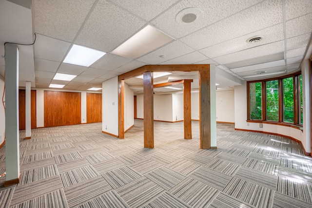 4303 Singleton Close, Rockford, IL 61114 - below grade area featuring a drop ceiling and light colored carpet