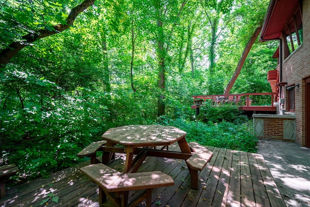 4303 Singleton Close, Rockford, IL 61114 - wooden deck featuring outdoor dining area