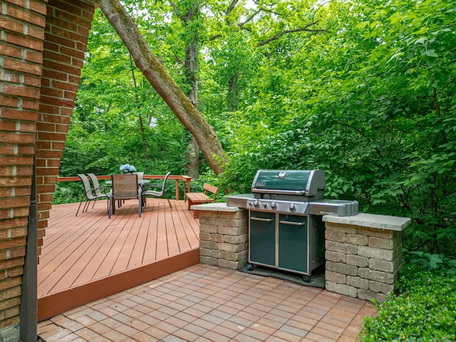 4303 Singleton Close, Rockford, IL 61114 - view of patio / terrace featuring area for grilling, a wooden deck, and outdoor dining area