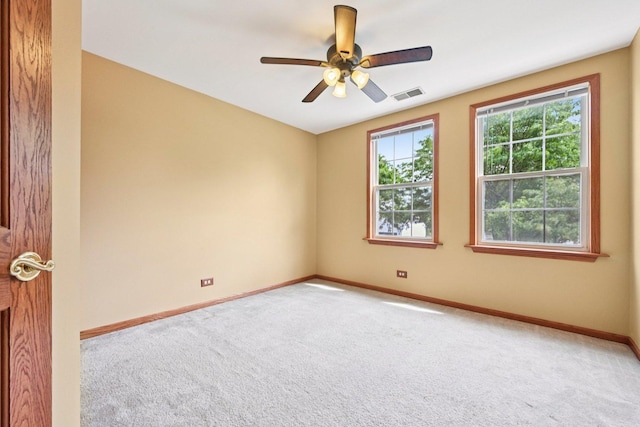 561 Ryegrass Trl, Aurora, IL 60504 - unfurnished room with carpet and a ceiling fan