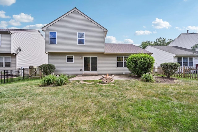 561 Ryegrass Trl, Aurora, IL 60504 - rear view of property with an outdoor fire pit, a patio, and a fenced backyard