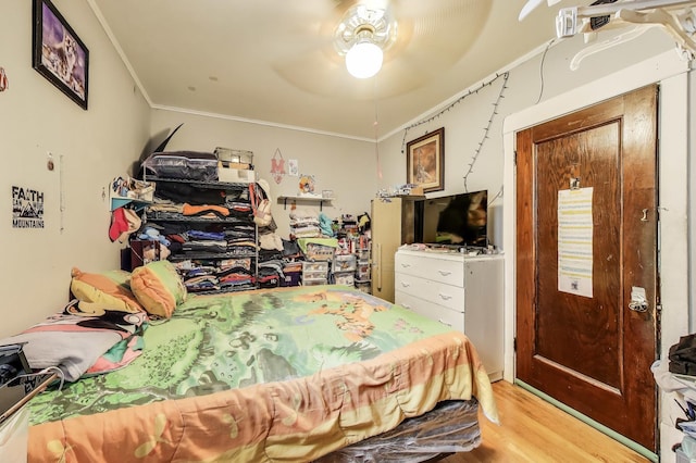 4444 N Spaulding Ave, Chicago, IL 60625 - bedroom featuring wood finished floors, ornamental molding, and ceiling fan