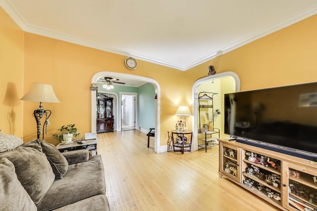 4444 N Spaulding Ave, Chicago, IL 60625 - living area featuring arched walkways, ornamental molding, and hardwood / wood-style flooring