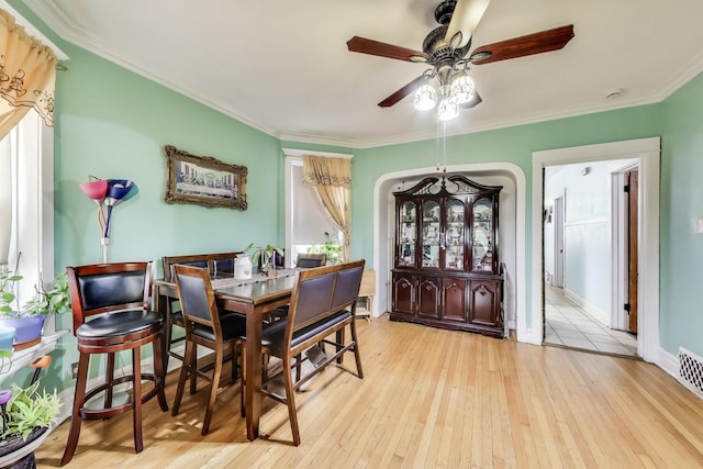 4444 N Spaulding Ave, Chicago, IL 60625 - dining room with a ceiling fan, light wood-style flooring, and crown molding