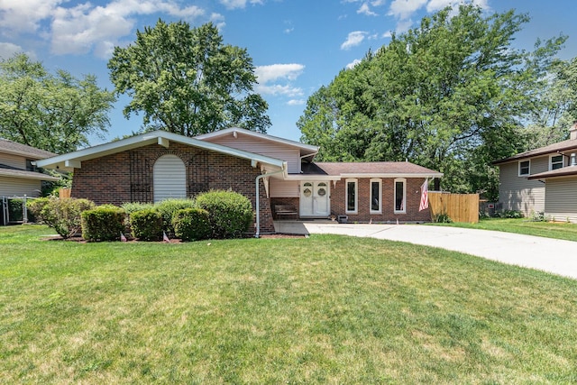 605 Parkshore Dr, Shorewood, IL 60404 - tri-level home with brick siding and concrete driveway