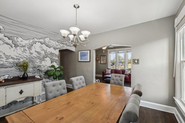 325 2nd St, Downers Grove, IL 60515 - dining area featuring arched walkways, wood finished floors, and a chandelier