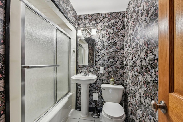 325 2nd St, Downers Grove, IL 60515 - bathroom featuring shower / bath combination with glass door, tile patterned floors, and wallpapered walls