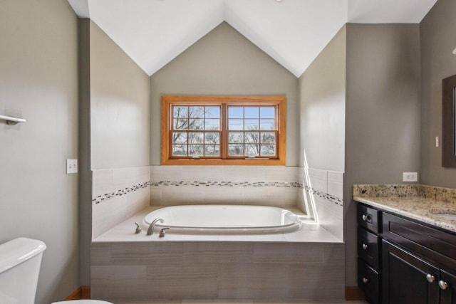 325 2nd St, Downers Grove, IL 60515 - bathroom featuring a bath, vanity, and vaulted ceiling