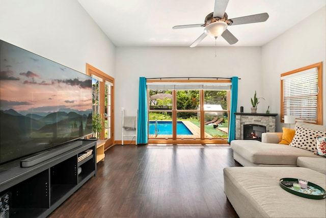 325 2nd St, Downers Grove, IL 60515 - living area featuring healthy amount of natural light, a fireplace, dark wood-style floors, and a ceiling fan