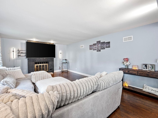 18118 Whitman Ln, Lansing, IL 60438 - living area with dark wood-type flooring and a fireplace