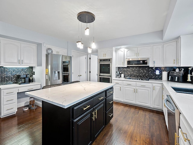 18118 Whitman Ln, Lansing, IL 60438 - kitchen featuring dark cabinetry, stainless steel appliances, white cabinets, and backsplash