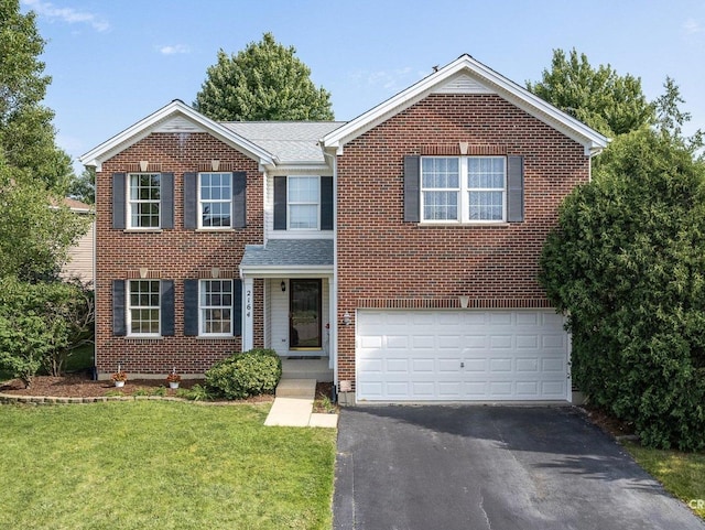 2164 Clementi Ln, Aurora, IL 60503 - view of front of property featuring asphalt driveway, an attached garage, a front lawn, and brick siding