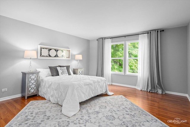2164 Clementi Ln, Aurora, IL 60503 - bedroom featuring baseboards and wood finished floors