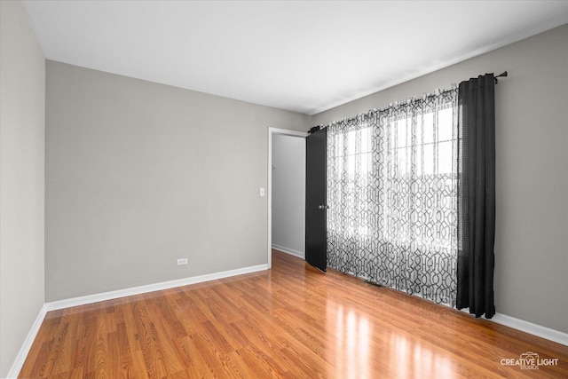 2164 Clementi Ln, Aurora, IL 60503 - empty room with wood finished floors