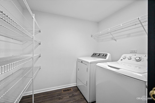 2164 Clementi Ln, Aurora, IL 60503 - laundry area featuring washer and dryer and dark wood finished floors