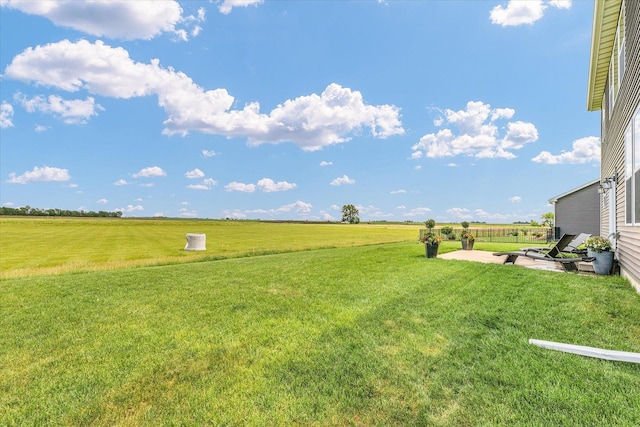 1908 Littlefield Ln, Mahomet, IL 61853 - view of green lawn with a patio area and a rural view
