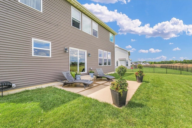 1908 Littlefield Ln, Mahomet, IL 61853 - back of house with a patio area