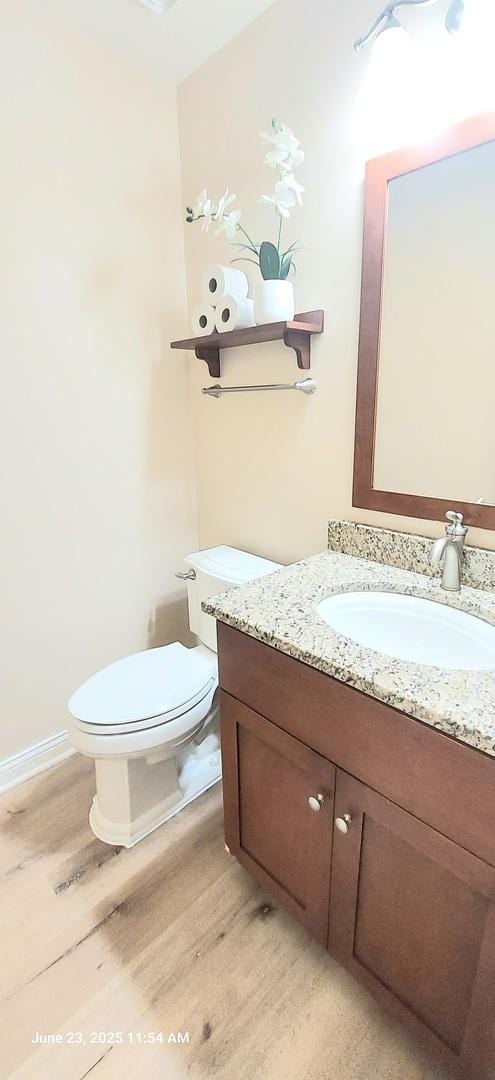 100 Hamlet Cir, Montgomery, IL 60538 - bathroom with vanity and wood finished floors