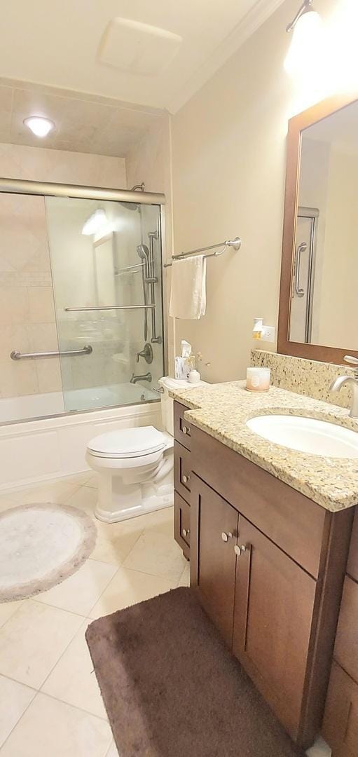 100 Hamlet Cir, Montgomery, IL 60538 - full bathroom with vanity, tile patterned flooring, shower / bath combination with glass door, and ornamental molding