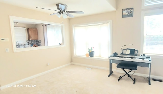 100 Hamlet Cir, Montgomery, IL 60538 - office space featuring plenty of natural light, ceiling fan, and carpet floors