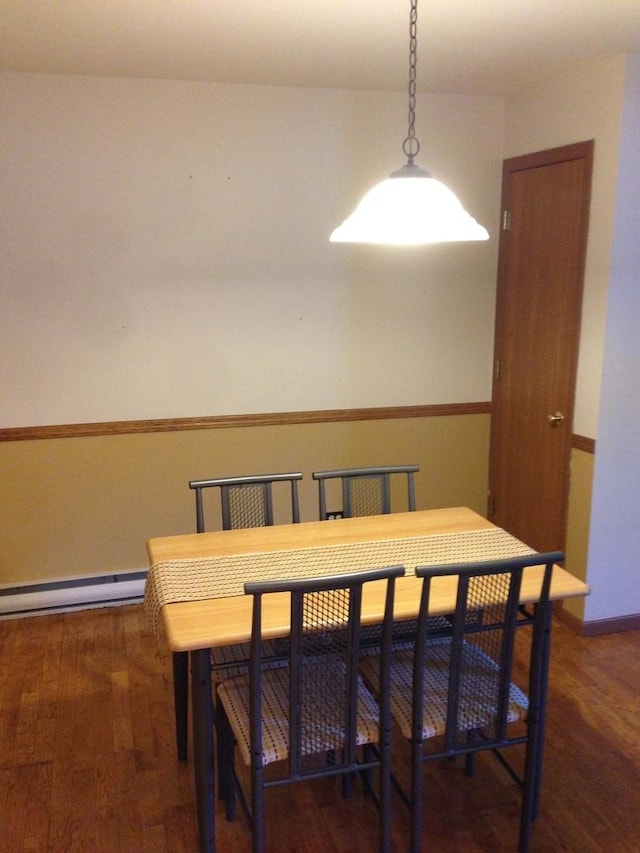 4305 W Shamrock Ln Unit 2F, Mchenry, IL 60050 - dining area with a baseboard radiator and wood finished floors