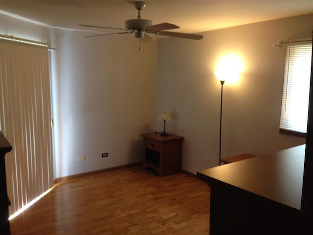 4305 W Shamrock Ln Unit 2F, Mchenry, IL 60050 - unfurnished office featuring a ceiling fan and wood finished floors