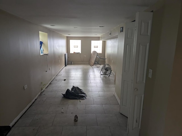 7017 S Hermitage Ave, Chicago, IL 60636 - hallway featuring baseboards and tile patterned flooring