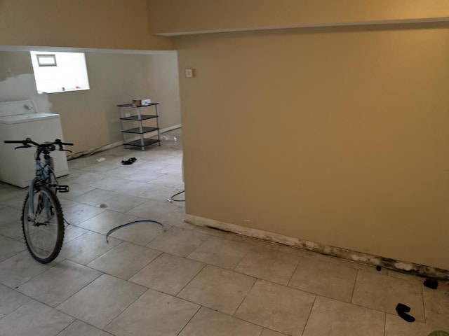7017 S Hermitage Ave, Chicago, IL 60636 - empty room featuring washer / clothes dryer and light tile patterned floors