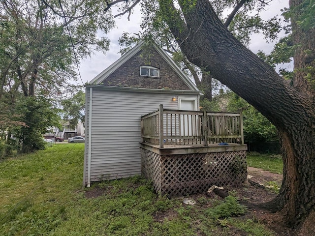 7017 S Hermitage Ave, Chicago, IL 60636 - back of property featuring a deck and a lawn