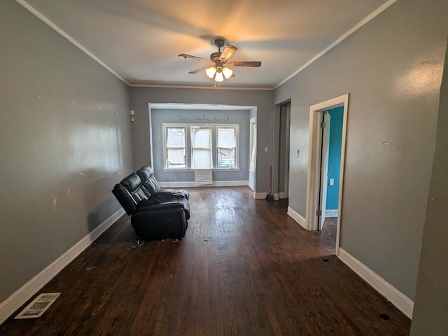 7017 S Hermitage Ave, Chicago, IL 60636 - unfurnished room featuring a ceiling fan, wood finished floors, and crown molding
