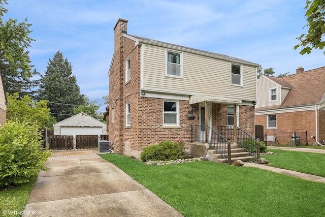 1316 Heidorn Ave, Westchester, IL 60145 - view of front facade featuring a chimney, an outdoor structure, and brick siding