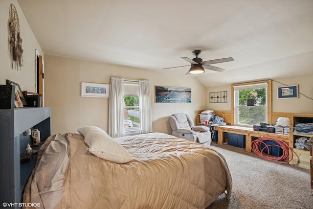 1316 Heidorn Ave, Westchester, IL 60145 - bedroom featuring carpet flooring, vaulted ceiling, ceiling fan, and a fireplace