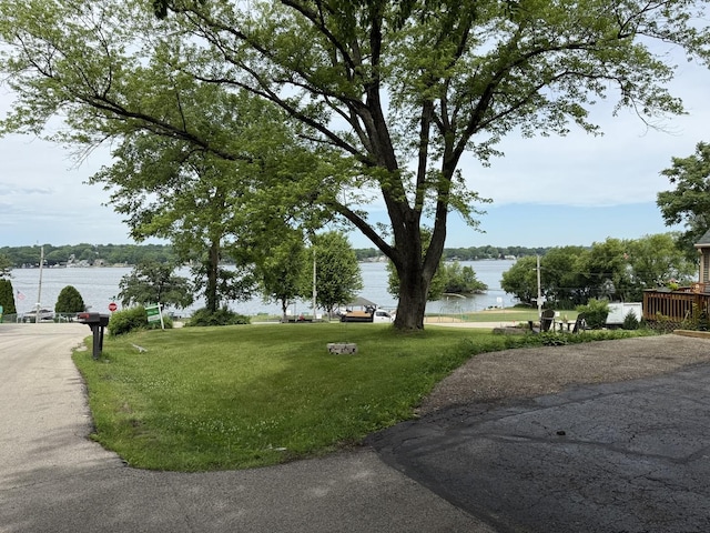 7718 Beach Rd, Wonder Lake, IL 60097 - view of home's community with a water view and a lawn