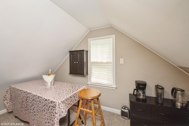 7718 Beach Rd, Wonder Lake, IL 60097 - dining area with light carpet and vaulted ceiling