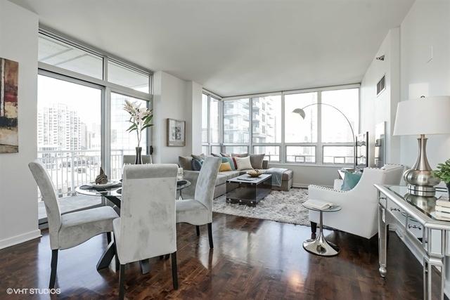 330 W Grand Ave Unit 2106, Chicago, IL 60654 - dining space with dark wood-type flooring