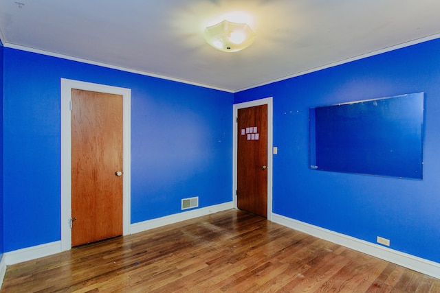 6444 N Oketo Ave, Chicago, IL 60631 - unfurnished room featuring wood finished floors and crown molding