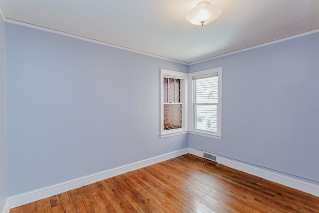 6444 N Oketo Ave, Chicago, IL 60631 - spare room with wood-type flooring and crown molding