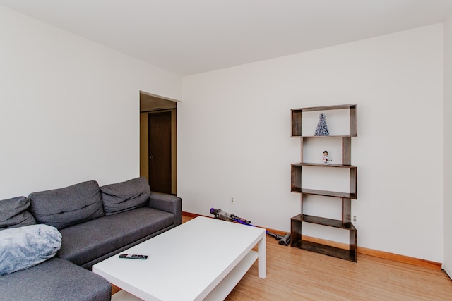 6444 N Oketo Ave, Chicago, IL 60631 - living room featuring light wood-style flooring and baseboards