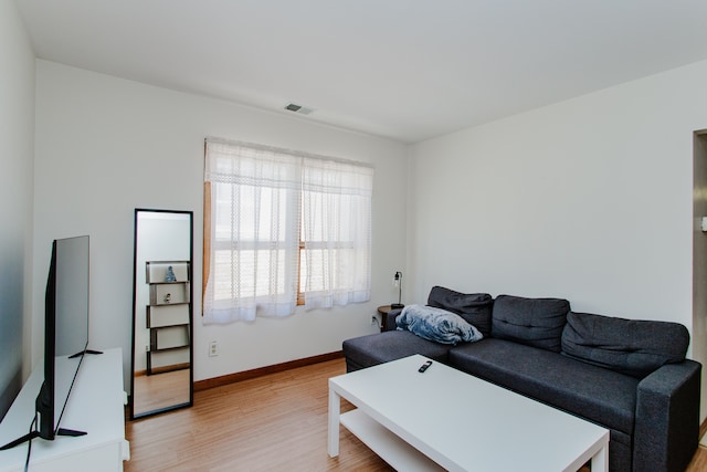 6444 N Oketo Ave, Chicago, IL 60631 - living area with light wood-style flooring and baseboards